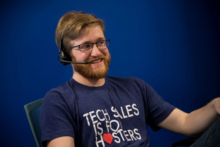 Memoryblue Tech Sales Representative Wearing A Headset
