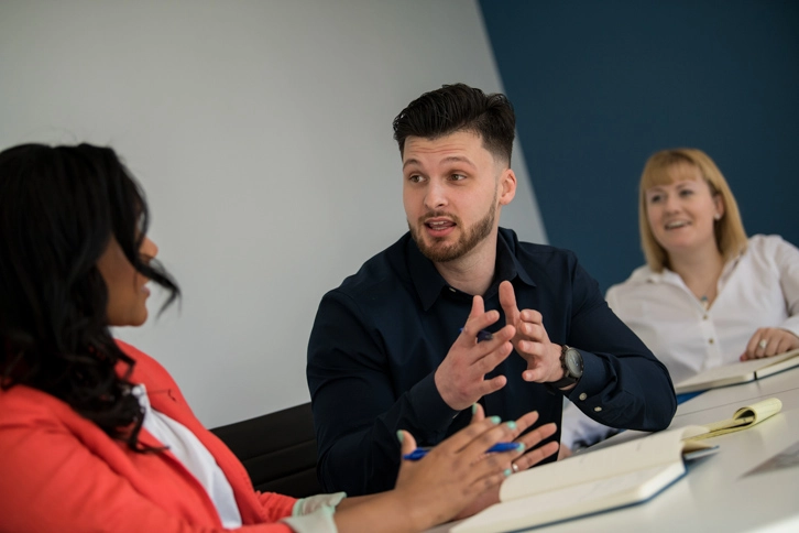 The Memoryblue Team Having A Meeting With A Client