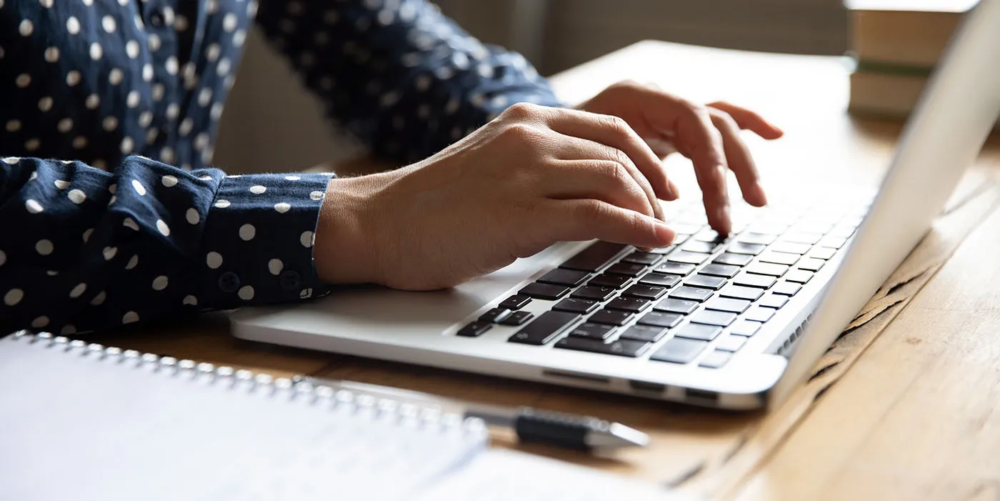 Typing On A Laptop