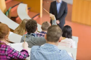 College student hand raised