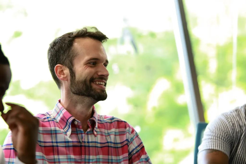 Memoryblue Sales Manager Smiling In Office